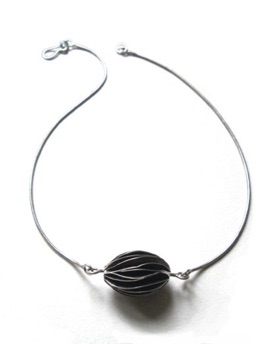 SEED $190-sterling silver necklace with bead of wavy silver pages
(16 1/2" snake chain)